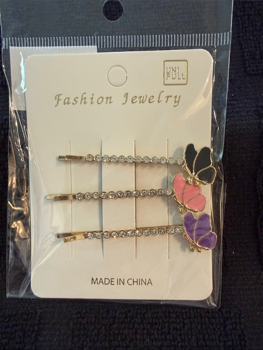 UNIF Crystal Butterfly Bobby Pin Trio in Black, Pink & Purple